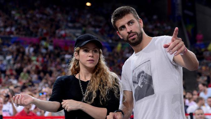 Penyanyi seksi asal Kolombia, Shakira bersama pasangannya, Gerard Pique. (AFP)
