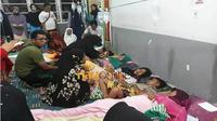 Ratusan warga Desa Koto Perambahan, Kecamatan Kampa keracunan usai menghadiri resepsi pernikahan, Sabtu, 30 Juni 2018. (Riauonline.co.id)
