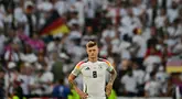 Ekspresi gelandang timnas Jerman, Toni Kroos usai pertandingan perempat final Euro 2024 melawan Spanyol di Stuttgart Arena, Stuttgart, 5 Juli 2024. (Tobias SCHWARZ/AFP)