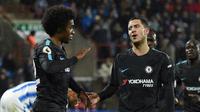 Carles Puyol memperingatkan barisan lini pertahanan Barcelona untuk mewaspadai pergerakan Willian, Eden Hazard, dan Pedro pada leg 2 babak 16 besar Liga Champions 2017-2018 di Camp Nou. (AFP/Oli Scarff)