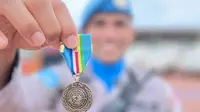Penghargaan PBB yang diterima personel Polda Riau sebagai pasukan perdamaian di Afrika Tengah. (Liputan6.com/Istimewa)