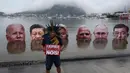 KTT G20 Brasil 2024 mengambil tiga topik utama, yakni perjuangan melawan kelaparan, kemiskinan, dan kesenjangan; keberlanjutan, perubahan iklim, dan transisi yang adil; dan reformasi tata kelola global. (Pablo PORCIUNCULA/AFP)