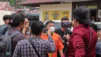 Konten Kreator Gorontalo yang akrab disapa AAN ditetapkan sebagai tersangka (Arfandi Ibrahim/Liputan6.com)