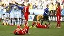 Ekspresi kekecewaan pemain Timnas Swiss usai dikalahkan Argentina di laga 16 besar Piala Dunia 2014 di Stadion Corinthians, Sao Paulo, (1/7/2014). (REUTERS/Kai Pfaffenbach)
