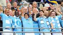 Carlos Tevez dkk merayakan gelar juara FA Cup setelah mengalahkan Stoke City 1-0 pada partai final di Wembley Stadium, 14 Mei 2011. AFP PHOTO/ANDREW YATES