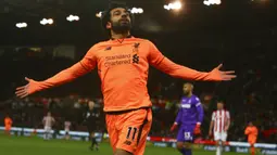 1. Mohamed Salah (Liverpool) - 12 Gol. (AFP/Geoff Caddick)