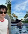 Lee Jong Suk liburan di Canggu, Bali. Mengenakan kaus putih dan celana pendek, ia tampil kasual, berenang pamer tubuh atletis, dan menonjolkan tren quiet luxury (@jongsuk0206)