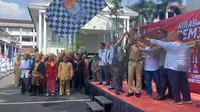 Kemeriahan tergambar ketika arak-arakan Kirab dan deklarasi Pemilu 2024 di Kota Bogor, Senin (6/11/2023). (Foto: Achmad Sudarno/Liputan6.com).