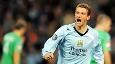 Manchester City's Elano celebrates after scoring against AC Omonia during the UEFA Cup first round second leg match at City of Manchester stadium, Manchester, on October 2, 2008. AFP PHOTO/ANDREW YATES 