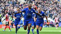 Wes Morgan, kapten Leicester City mengaku menjalani masa kecil yang keras. BEN STANSALL / AFP