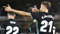 Selebrasi Borja Mayoral usai mencetak gol Real Madrid ke gawang Real Sociedad. (ANDER GILLENEA / AFP)