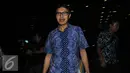Gubernur Sumbar, Irwan Prayitno enggan berkomentar usai diperiksa KPK, Jakarta, Jumat,(12/8). Irwan memilih diam dan menyuruh wartawan menanyakan langsung kepada penyidik. (Liputan6.com/Helmi Afandi)