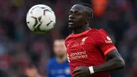 Sadio Mane. Pemain sayap Senegal berusia 29 tahun yang telah 6 musim berseragam Liverpool ini berada di peringkat kedua sebagai pemain aktif pencetak gol terbanyak bagi Liverpool di semua ajang kompetisi. Ia telah mencetak 111 gol dan 45 assist di semua ajang kompetisi. (AFP/Glyn Kirk)