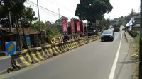 Jembatan Cisadane di Cisalopa, Caringin, Bogor, akan diperbaiki dengan memakan waktu sekitar 4 bulan. (Liputan6.com/Achmad Sudarno)