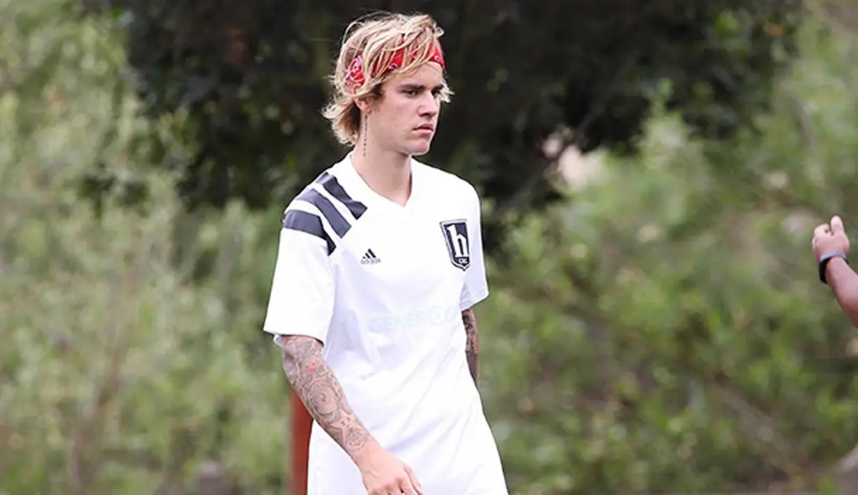 "Justin sangat patah hati sekarang dan ia tengah mencoba untuk tidak memikirkan jarak dari Selena," ujar sumber. (RSMX/starmaxinc.com/REX/Shutterstock/HollywoodLife)