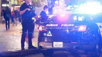Polisi merespons insiden penembakan massal di Seattle, Amerika Serikat saat demo Donald Trump menang jadi presiden AS. (Seattle Times)