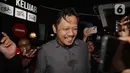 Dalam kasus ini KPK pada 9 Januari 2026 telah mengumumkan dua tersangka kasus dugaan korupsi kuota haji di Kementerian Agama tahun 2023-2024, yakni Yaqut Cholil Qoumas (YCQ), dan Ishfah Abidal Aziz (IAA). Tampak dalam foto, Ketua Bidang Ekonomi Pengurus Besar Nahdlatul Ulama (PBNU), Aizzudin Abdurrahman (AIZ) berjalan meninggalkan Gedung Merah Putih Komisi Pemberantasan Korupsi (KPK) usai menjalani pemeriksaan, Jakarta, Selasa (13/1/2026). (Liputan6.com/Helmi Fithriansyah)