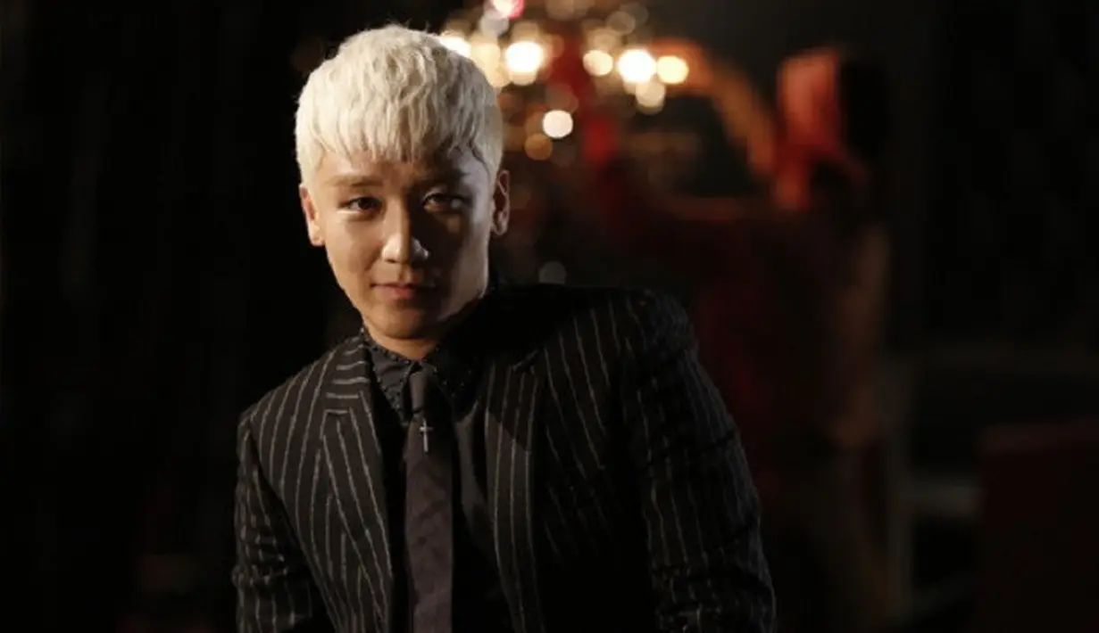 Pada kesempatan itu, maknae BigBang itu mengungkapkan betapa cintanya pada T.O.P dan GD yang sedang melaksanakan wajib militer. (Foto: soompi.com)