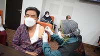 Vaksinasi booster di Unusa. (Dian Kurniawan/Liputan6.com)