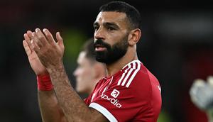 Kendati masih memiliki kontrak satu musim lagi, Salah dipastikan akan hengkang dengan status bebas transfer. Kesepakatan dengan pihak klub sudah tercapai lebih dulu. (AFP/Paul Ellis)