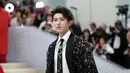 Pria kelahiran  2 Agustus 1998 ini adalah salah satu bintang terbesar di China, dengan lebih dari 38,2 juta pengikut di Weibo. (Photo by Mike Coppola / GETTY IMAGES NORTH AMERICA / Getty Images via AFP)