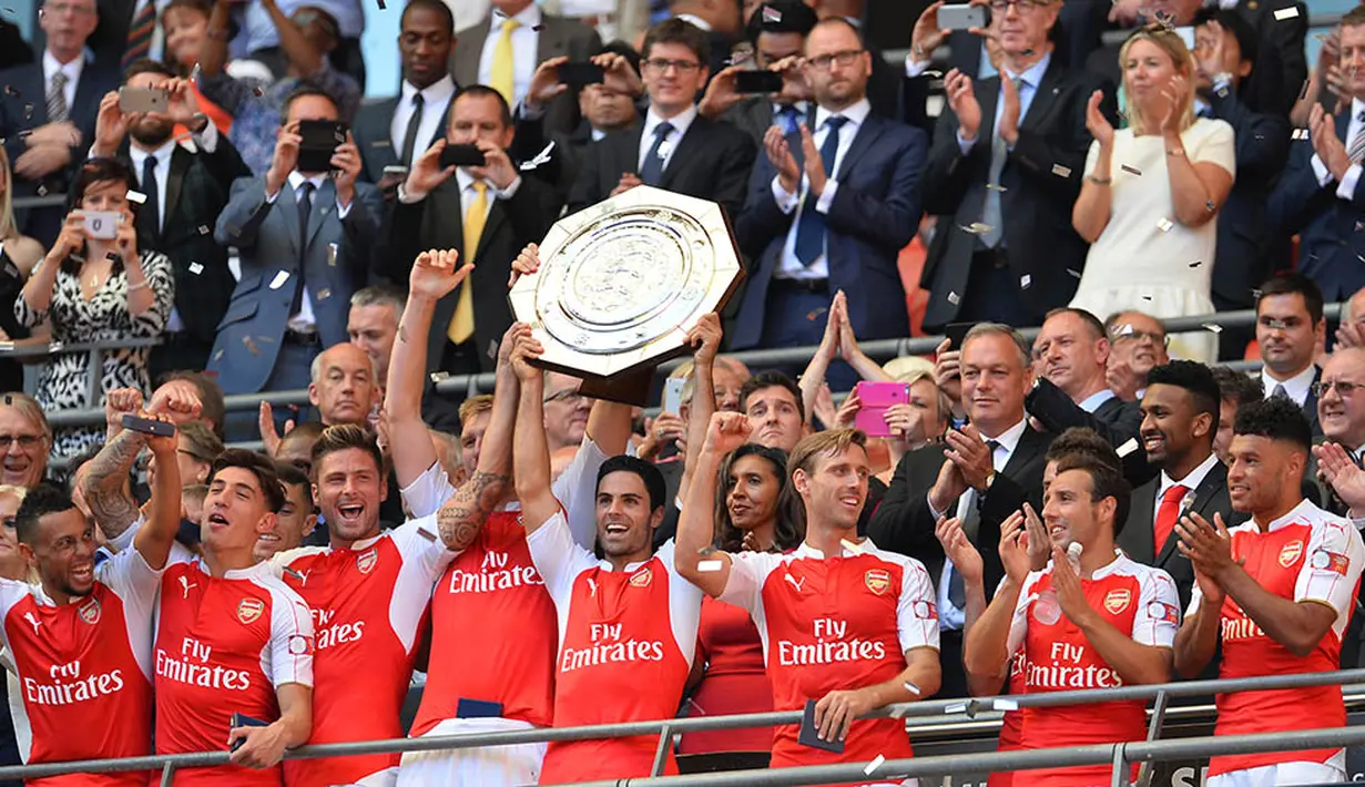 Musim 2015/2016, diawali Arsenal dengan manis usai meraih gelar Community Shield. The Gunners sukses menaklukan Chelsea 1-0. (AFP/Glyn Kirk)