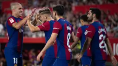 Gelandang Barcelona, Fermin Lopez (kedua kiri) merayakan gol yang dicetaknya saat pertandingan sepak bola Liga Spanyol melawan Sevilla FC di stadion Ramon Sanchez Pizjuan, Sevilla, 26 Mei 2024. (JORGE GUERRERO/AFP)