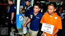 Polda Metro Jaya menggelar rekonstruksi pembunuhan Asep Suryadi, petugas parkir di Pusat Perbelanjaan Senayan, Jakarta, Jumat (2/10/2015). Reka ulang ini diperagakan langsung oleh tersangka, Ali Akbar alias Ali Tomket. (Liputan6.com/Andrian M Tunay)