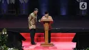 Wapres Ma'ruf Amin (kanan) memberikan pidato sekaligus menutup Rakornas Indonesia Maju antara Pemerintah Pusat dan Forum Koordinasi Pimpinan Daerah di Bogor, Jawa Barat, Rabu (13/11/2019). Kegiatan itu untuk mensinergikan program-program pemerintah pusat dengan daerah. (Liputan6.com/Herman Zakharia)