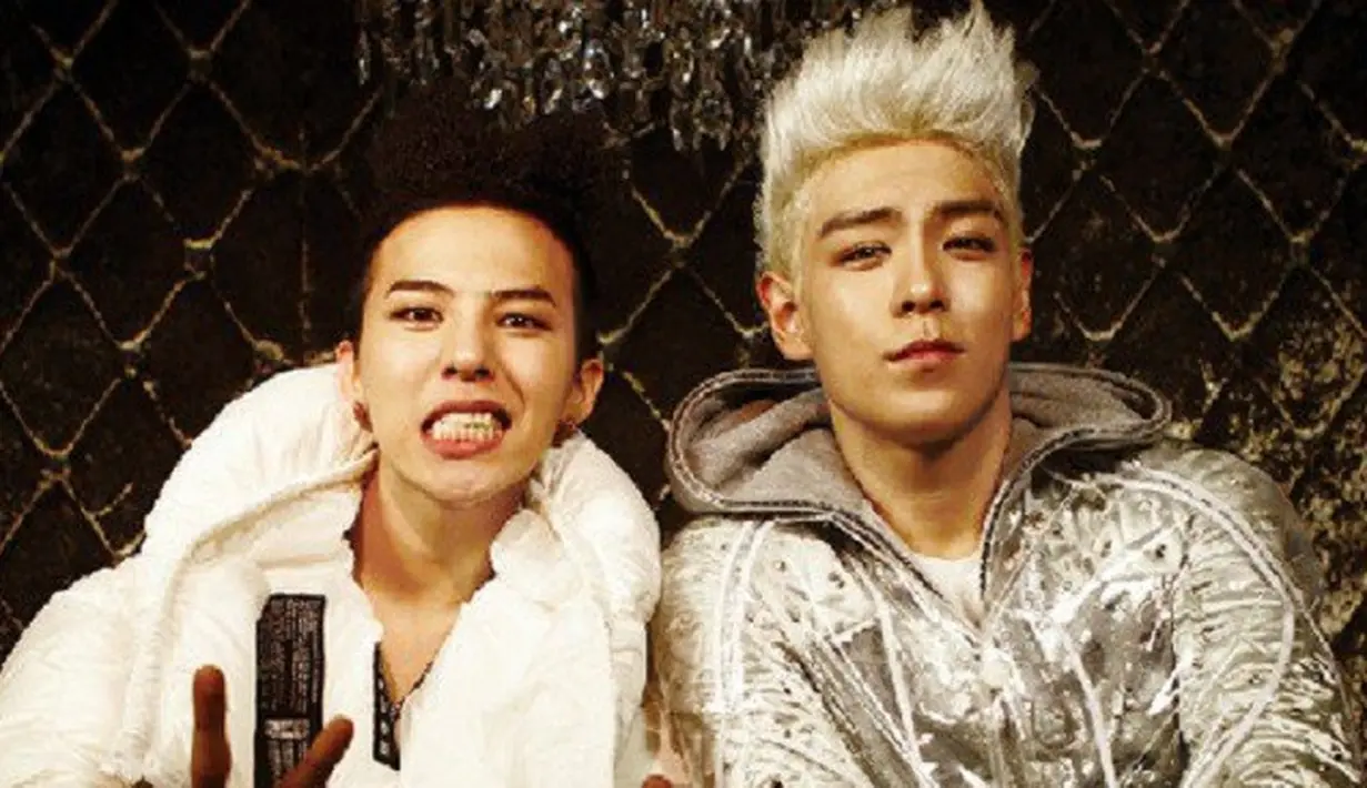 Pada 2012, G-Dragon dan T.O.P berkerjasama dengan Pixie Lott di lagu Dancing On My Own. Walaupun dirilis dalam album versi Jepang, akan tetapi lagu dinyanyikan dengan bahasa Inggris. (Foto: allkpop.com)