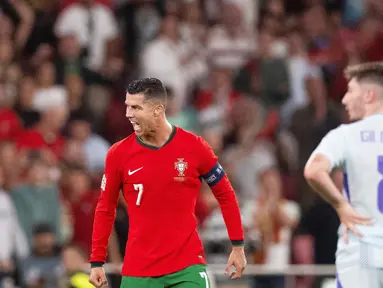Cristiano sukses menjadi pahlawan Portugal saat menumbangkan Skotlandia dalam laga UEFA Nations League 2024/2025 yang digelar di Estadio da Luz, Lisbon pada Senin (9/9/2024) dimi hari WIB. (AFP/Patricia De Melo Moreira)