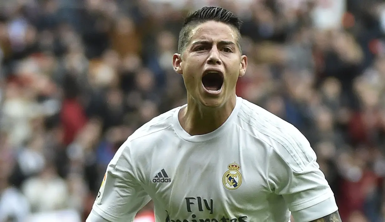 Pemain Real Madrid, James Rodriguez saat merayakan golnya ke gawang  Athletic Club Bilbao pada Laga Lanjutan pekan ke-24 La Liga Spanyol di Stadion Santiago Bernabeu,  Madrid. (AFP / Gerard Julien)
