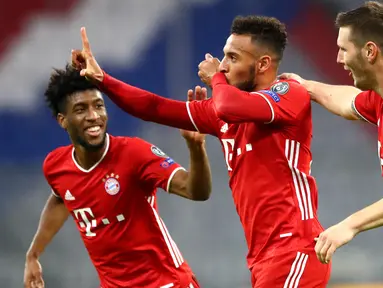 Gelandang Bayern Munchen, Corentin Tolisso (tengah) dan timnya berselebrasi setelah mencetak gol ke gawang Atletico Madrid pada matchday pertama Grup A Liga Champions di Allianz Arena, Kamis (22/10/2020) dini hari WIB. Bayern berhasil mencukur Atletico Madrid 4-0. (AP Photo/Matthias Schrader,Pool)