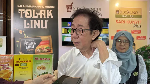 Direktur Sido Muncul Irwan Hidayat menghadiri seminar internasional di Balai Krida Poltekkes Surakarta pada Rabu (11/2/2026). (Liputan6.com/Fajar)