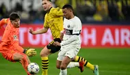 Dortmund tetap perkasa di puncak klasemen grup F dengan mengoleksi 11 poin. (INA FASSBENDER / AFP)