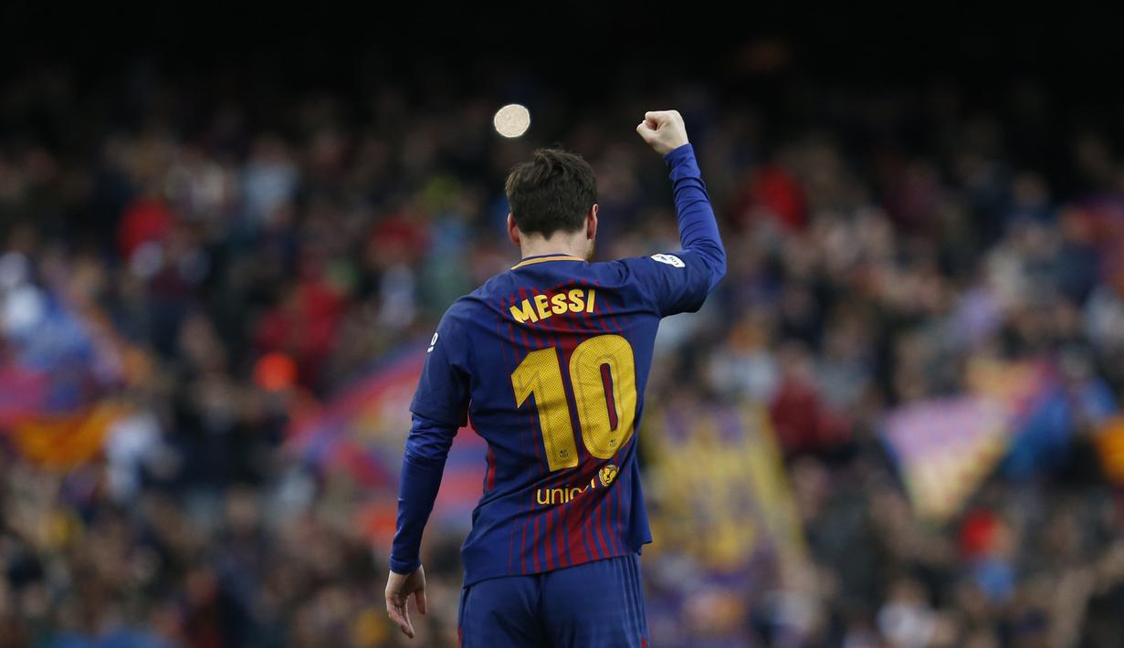 Gelandang Barcelona, Lionel Messi, merayakan gol yang dicetaknya ke gawang Atletico Madrid pada laga La Liga Spanyol di Stadion Camp Nou, Barcelona, Minggu (4/3/2018). Barcelona menang 1-0 atas Atletico. (AFP/Pau Barrena)