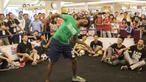 Seorang freestyler memainkan bola dengan kepala pada acara  Indonesian  Freestyle Football Championship 2015 di Mall Pluit Village, Jakarta, Sabtu (14/11/2015). (Bola.com/Vitalis Yogi Trisna)