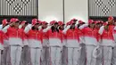Kontingen Indonesia saat memberikan hormat kepada bendera merah putih saat acara Pengukuhan dan Pelepasan Kontingen untuk SEA Games 2015 Singapura di Senayan, Jakarta, (25/5/2015). (Liputan6.com/Andrian M Tunay)