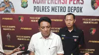 Wakasat Reskrim Polres Metro Depok, AKP Markus Simaremare menjelaskan kronologis video baku hantam siswi yang viral di media sosial. (Liputan6.com/Dicky Agung Prihanto)