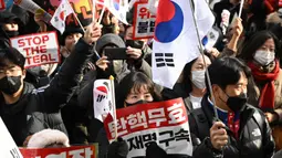 Diketahui, pihak penyidik telah mengajukan permintaan surat perintah untuk menahan Presiden Korea Selatan yang dimakzulkan, Yoon Suk Yeol, atas penerapan darurat militer. (JUNG Yeon-je/AFP)