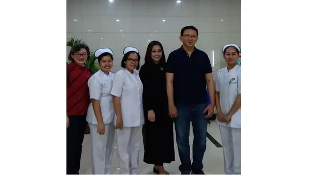 Ahok setia menemani sang istri memeriksakan kondisi kehamilan.