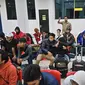 TKI korban perdagangan orang di Korsel tiba di Bandara Soetta  (Liputan6.com/ Pramitha Tristiawati)