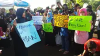 Sejumlah perempuan dari Koalisi Perempuan Indonesia (KPI) demonstrasi menolak eksekusi mati Merry Utami (Hanz Jimenez Salim/Liputan6.com)