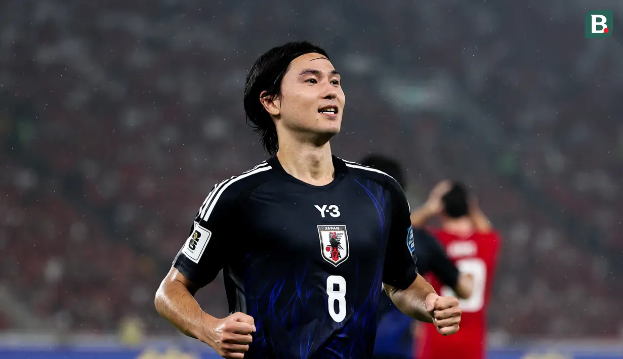 <p>Pemain Timnas Jepang,&nbsp;Takumi Minamino, merayakan gol ke gawang Timnas Indonesia pada Kualifikasi Piala Dunia 2026 Zona Asia di Stadion Gelora Bung Karno, Senayan, Jakarta, Jumat (15/11/2024) malam WIB. (Bola.com/Abdul Aziz)</p>