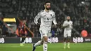 Selebarasi pemain Manchester United, Bruno Fernandes usai mencetak gol perdana untuk Setan Merah ke gawang Bournemouth pada pertandingan pekan ke-31 Liga Inggris 2025/2026 di Vitality Stadium, Sabtu (21/03/2026) dini hari WIB. (AFP/Glyn Kirk)