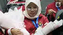 Atlet disabilitas tunanetra Firstania Kayla asal DKI Jakarta berhasil meraih medali perunggu cabang olahraga renang. (merdeka.com/Imam Buhori)