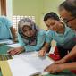 Tenaga dokter hewan di Indonesia kini sudah punya kemampuan layaknya detektif. (Dok FAO Indonesia)