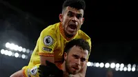 Luis Diaz dan Diogo Jota berselebrasi bersama saat mencetak gol untuk Liverpool. (Ian Kington / IKIMAGES / AFP)