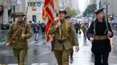 Peserta berbaris di Fifth Avenue saat parade Hari Veteran, New York, Amerika Serikat, 11 November 2022. Perayaan Hari Veteran di Amerika Serikat bertepatan dengan peringatan Armistice Day (Hari Gencatan Senjata) yang diperingati di Prancis, Selandia Baru dan Negara-negara Persemakmuran, atau disebut Remembrance Day di Britania Raya, Kanada, dan Australia. (AP Photo/Mary Altaffer)