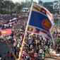 Suasana kemeriahan parade ASEAN 50 Tahun di Jakarta, Minggu (27/8). Acara ini menampilkan Parade Bendera ASEAN, Parade kostum, Parade tari musik, dan keunikan lainnya. (Liputan6.com/Angga Yuniar)
